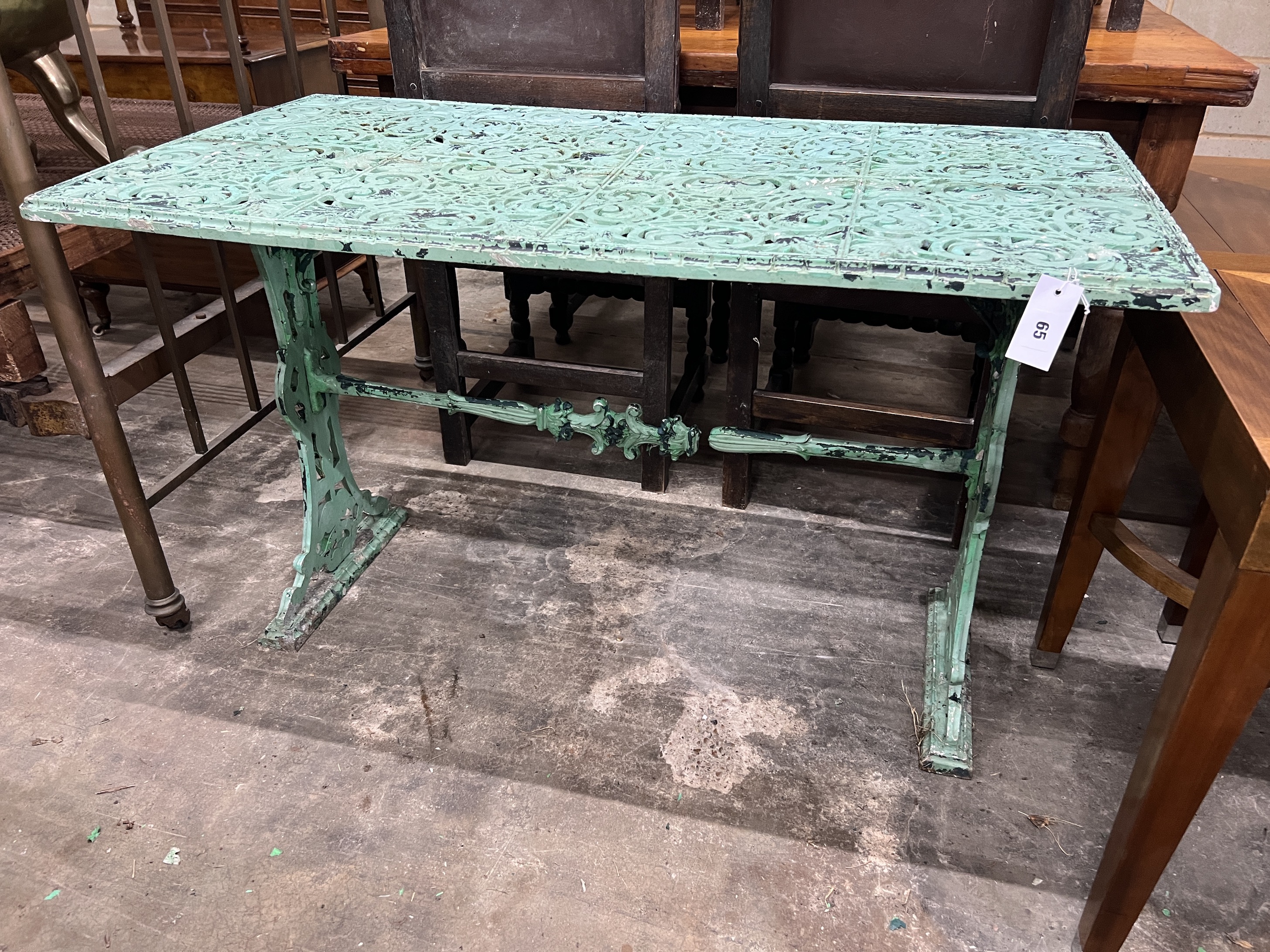 A Victorian style rectangular aluminium garden table, width 114cm, depth 58cm, height 69cm